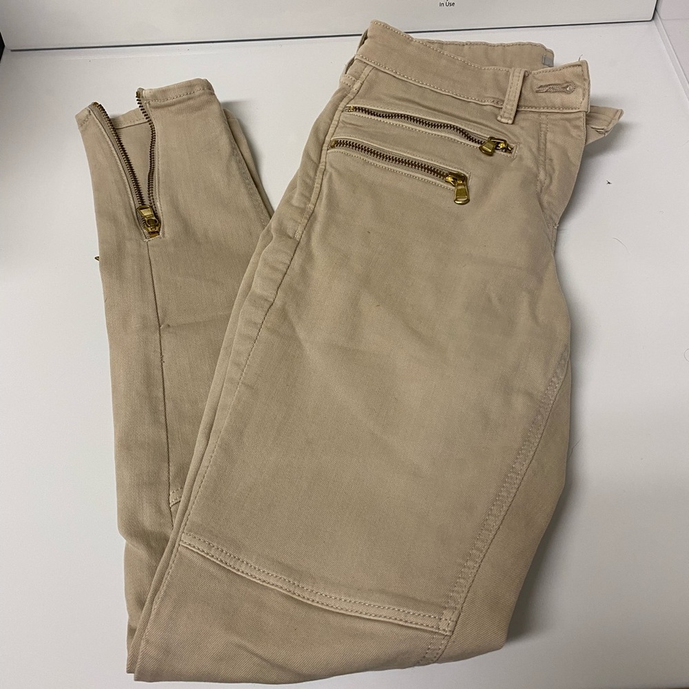 H&M tan pants with zippers. Size 2.